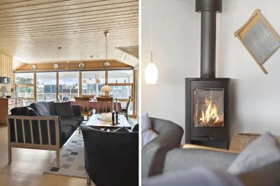 two pictures of a living room with a fireplace at 862-Thisted-Nordsovej-162 in Thisted