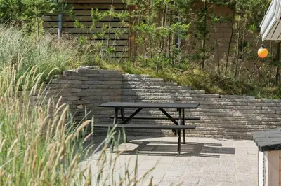 a picnic table sitting in front of a brick stairs at 727-Thisted-Blamunkevej-11 in Thisted