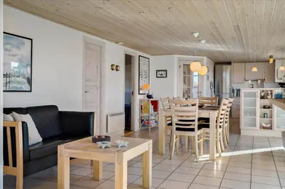a living room with a couch and a dining room at 608-Thisted-Vesterhavsgade-49-A in Thisted