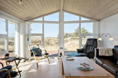 a living room with a couch and chairs and a table at 608-Thisted-Vesterhavsgade-49-A in Thisted