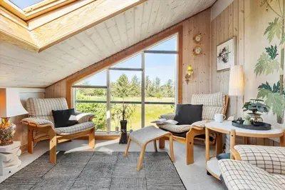 a living room with furniture and a large window at 675-Thisted-Tunvej-15 in Thisted