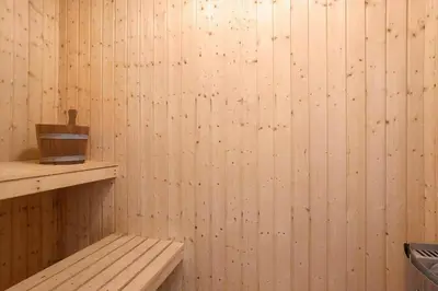 a room with a wooden wall with a wooden shelf at 446-Thisted-Nordsovej-206-F in Thisted