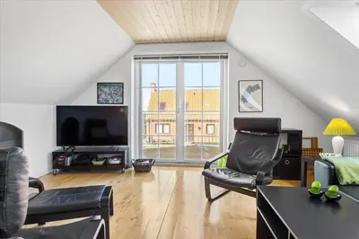 a living room filled with furniture and a large window at 133-Thisted-Jorgen-Hedes-Vej-10 in Thisted