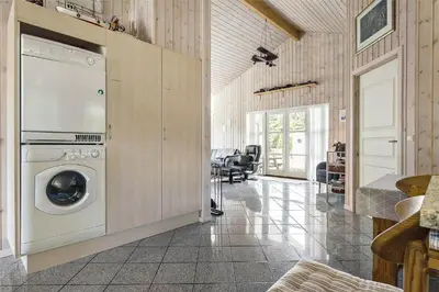 a kitchen with a washing machine in a room at 879-Thisted-Pighvarvej-3 in Thisted