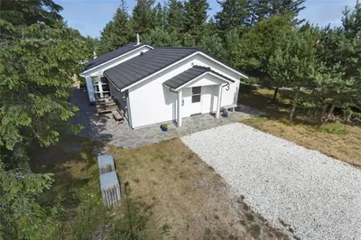 an overhead view of a small white cabin with a roof at 879-Thisted-Pighvarvej-3 in Thisted