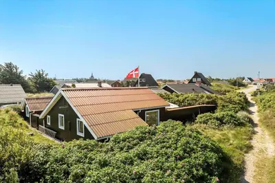 a house with a brown roof on a hill at 145-Thisted-Fiskervej-25-B in Thisted