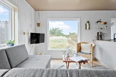 a living room with a couch and a table at 145-Thisted-Fiskervej-25-B in Thisted