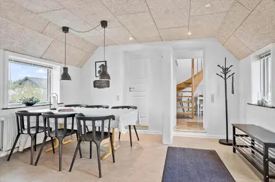 a kitchen and dining room with a table and chairs at 172-Thisted-Fiskervej-72 in Thisted