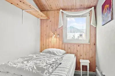 a bedroom with a bed and a window at 276-Thisted-Nordsovej-76 in Thisted