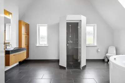 a bathroom with a shower and a sink and a toilet at 186-Vestervig-Magevej-5 in Vestervig