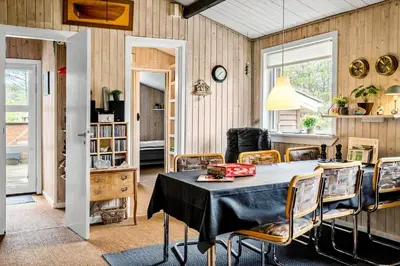 a dining room with a table and chairs at 815-Thisted-Blamunkevej-45 in Thisted