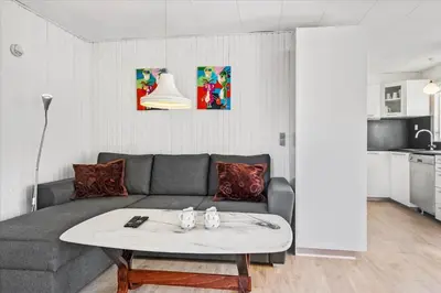 a living room with a couch and a table at 828-Thisted-Orredvej-13 in Thisted