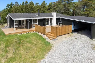 a house with a porch and a deck at 638-Thisted-Lyngvej-6 in Thisted