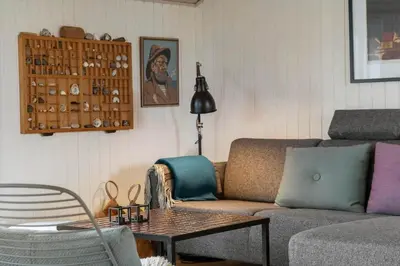 a living room with a couch and a table at 904-Thisted-P-Bolesens-Vej-15 in Torsted