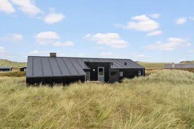 a black house in the middle of a field at 904-Thisted-P-Bolesens-Vej-15 in Torsted