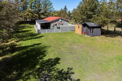 a house in a field with a yard at 535-Thisted-Molgaardsvej-75 in Thisted