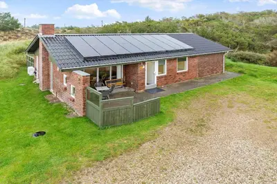 an aerial view of a house with solar panels on it at 991-Thisted-Liusborg-Sti-23 in Torsted