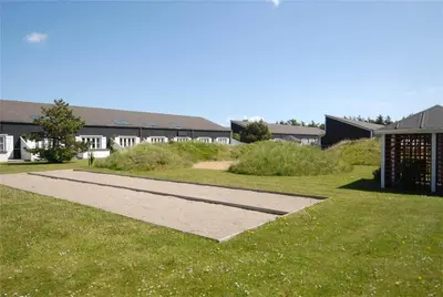 a walkway in the grass in front of a building at 266-Vestervig-Havnevej-1-lejl-19 in Vestervig
