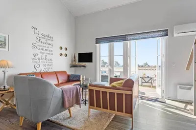 a living room with two chairs and a couch at 417-Vestervig-Havnevej-1-lejl-17 in Vestervig