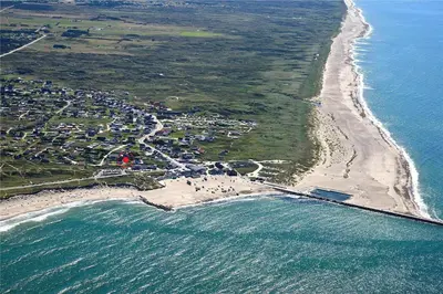 an aerial view of a beach and the ocean at 827-Thisted-Orredvej-11 in Thisted