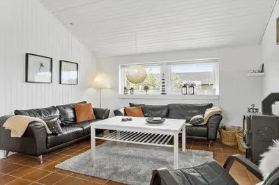 a living room with a couch and a table at 760-Thisted-Pighvarvej-30 in Thisted