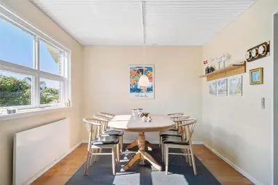 a dining room with a table and chairs at 659-Thisted-Orredvej-7 in Thisted