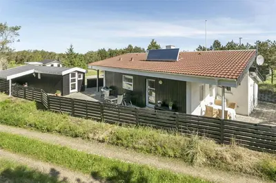 a house with a solar panel on top of it at 458-Thisted-Sandtornvej-18 in Thisted