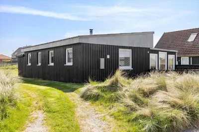 a black house on the side of a field at 271-Thisted-Nordsovej-88 in Thisted