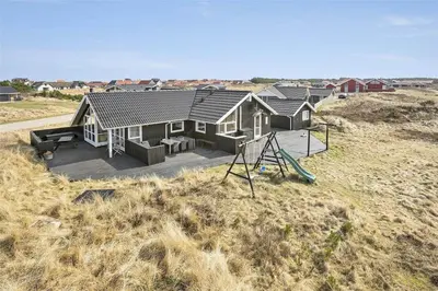 an aerial view of a house with a playground at 938-Thisted-Niels-Vognmands-Vej-8 in Torsted