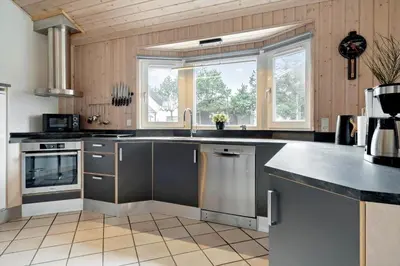 a kitchen with a sink and a dishwasher at 854-Thisted-Molgaardsvej-3 in Thisted