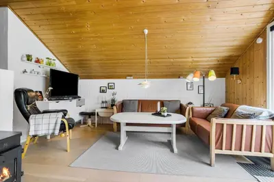 a living room with a couch and a table at 834-Thisted-Revlingvej-9 in Thisted