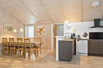 a kitchen and dining room with a table and chairs at 599-Thisted-Fiskervej-165 in Thisted