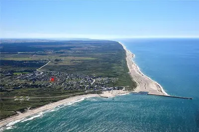 an aerial view of a beach and the ocean at 376-Thisted-Fiskervej-55 in Thisted