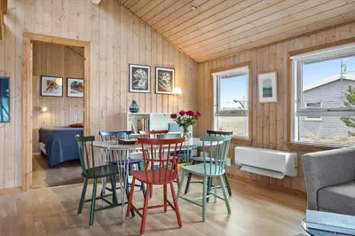 a dining room with a table and chairs at 376-Thisted-Fiskervej-55 in Thisted