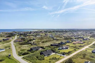 an aerial view of a village with houses and a road at 951-Thisted-Bavnbak-39 in Torsted