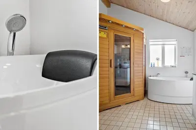 a bathroom with a chair and a bath tub at 928-Thisted-Kobbelsti-15 in Torsted