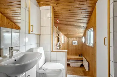 a bathroom with a white sink and a toilet at 533-Thisted-Fiskervej-153 in Thisted