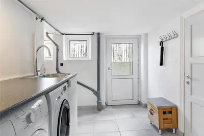 a kitchen with a sink and a washing machine at 204-Vestervig-Lodbjergvej-4 in Vestervig