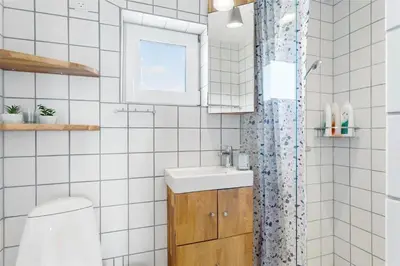a bathroom with a sink and a toilet at 204-Vestervig-Lodbjergvej-4 in Vestervig