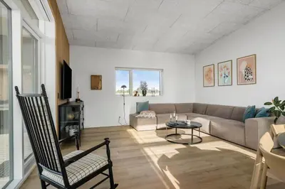a living room with a couch and a table at 109-Thisted-Lyngbakken-9 in Thisted