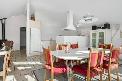 a kitchen with a white table and chairs at 542-Thisted-Kuttervej-11 in Thisted