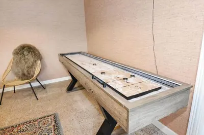 a wooden table in a room with a chair at 194-Vestervig-Vesterhavsvej-7-C in Vestervig