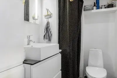 a bathroom with a sink and a toilet at 1012-Thisted-Trindbak-12-B in Torsted