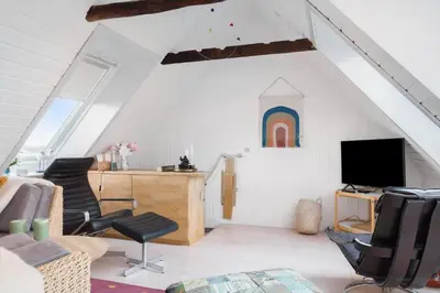 a living room with a couch and a tv at 1012-Thisted-Trindbak-12-B in Torsted
