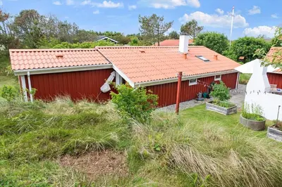 a red house with a red roof at 531-Thisted-Ingerslevvej-5 in Thisted