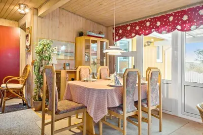a dining room with a table and chairs at 860-Thisted-Gronnevej-6 in Thisted