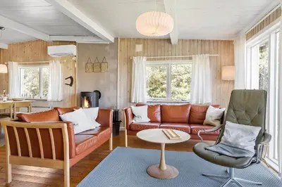 a living room with a couch and a table at 151-Thisted-Havbovej-39 in Thisted