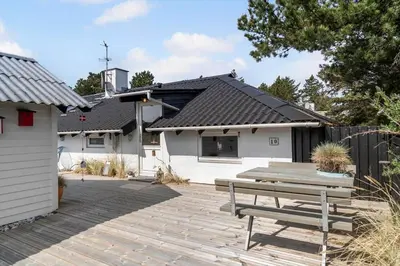 a house with a picnic table in front of it at 713-Thisted-Tranebaervej-10 in Thisted