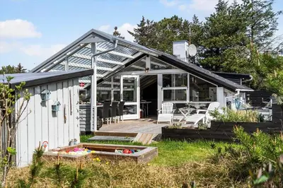 a house with a porch and a patio at 713-Thisted-Tranebaervej-10 in Thisted