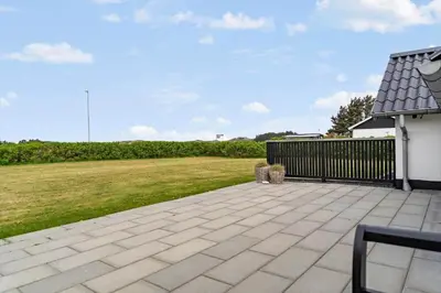 a patio with a fence and a grass yard at 382-Thisted-Kristinesvej-2 in Thisted